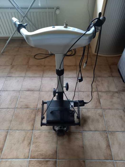 Foto Brems-und Schiebehilfe für Rollstuhl