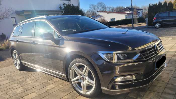 Foto VW Passat mit Handgerät + EDAG Verladesystem