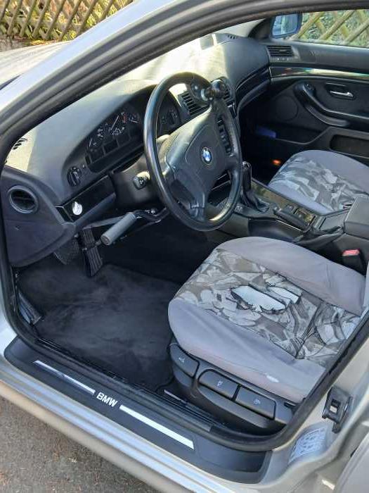 Foto BMW E39 mit Handbedienung links und Lenkradknauf