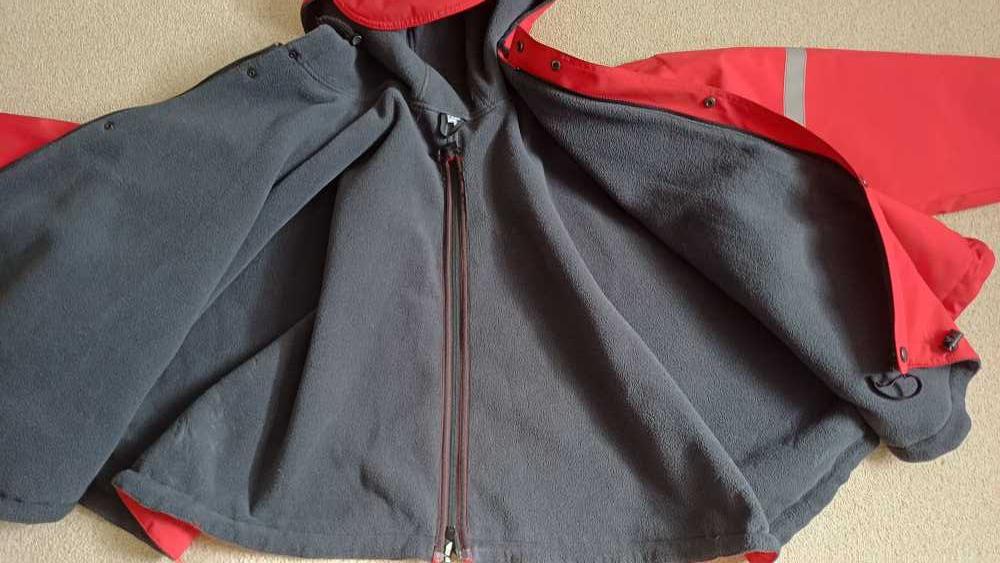 Foto Schalenrollstuhl Winterjacke mit Ärmel