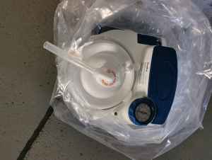 Hilfsmittel: VacuAide Absauggerät